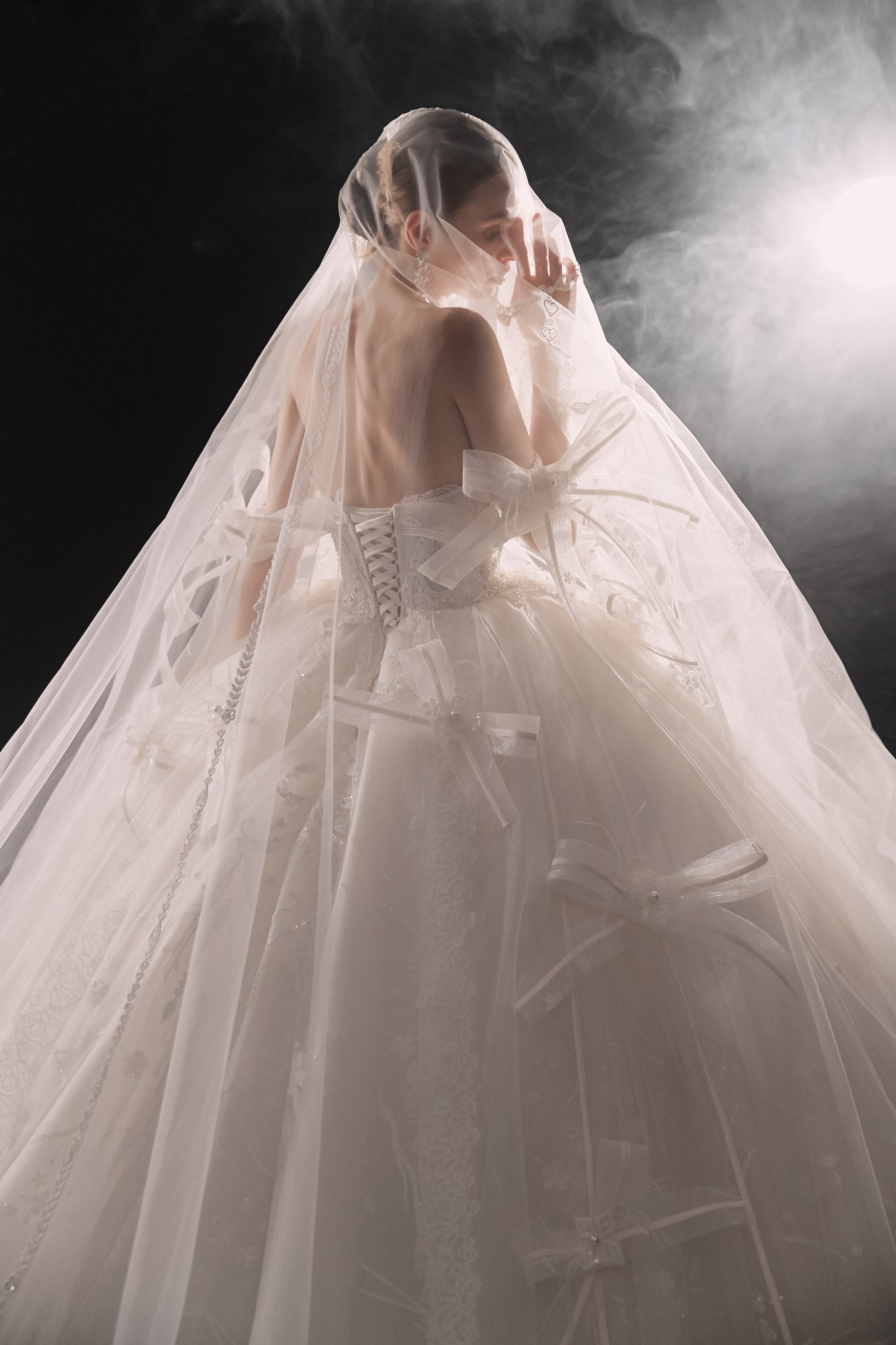 Ethereal Strapless Tulle Ball Gown Wedding Dress with Cathedral Train & Delicate Bows