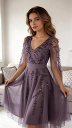 Woman in elegant lavender embroidered evening dress seated on sofa, ZAPDRESS fashion