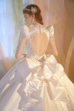 Regal V-Neck Satin Ball Gown Wedding Dress with Oversized Bow & Cathedral Train