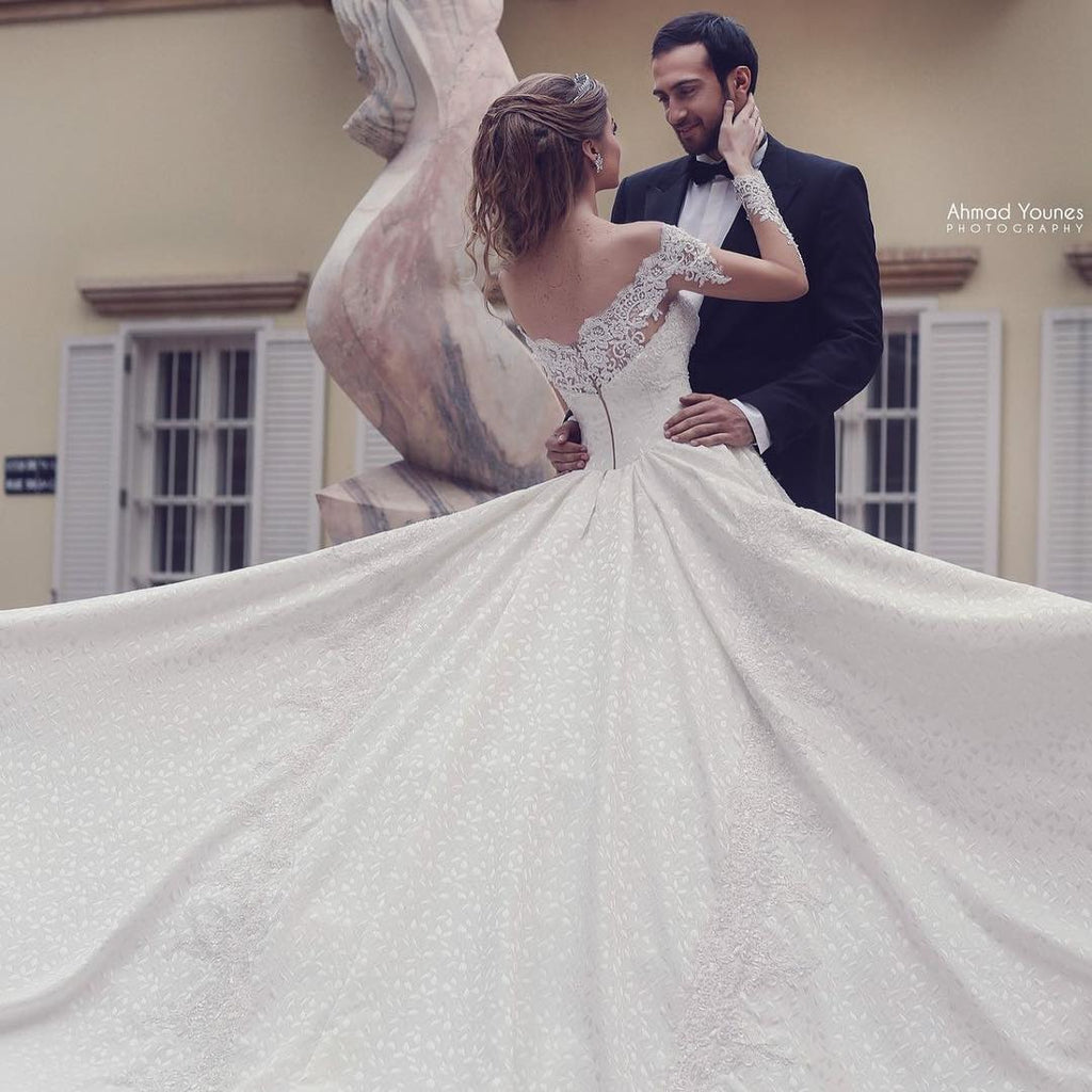 Elegant Long A-Line Off-the-Shoulder Backless Appliques Lace Wedding Dress with Sleeves