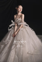 Ethereal Strapless Tulle Ball Gown Wedding Dress with Cathedral Train & Delicate Bows