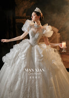 Ethereal Puff Sleeve Beaded Ball Gown Wedding Dress with Cathedral Train & Illusion Back