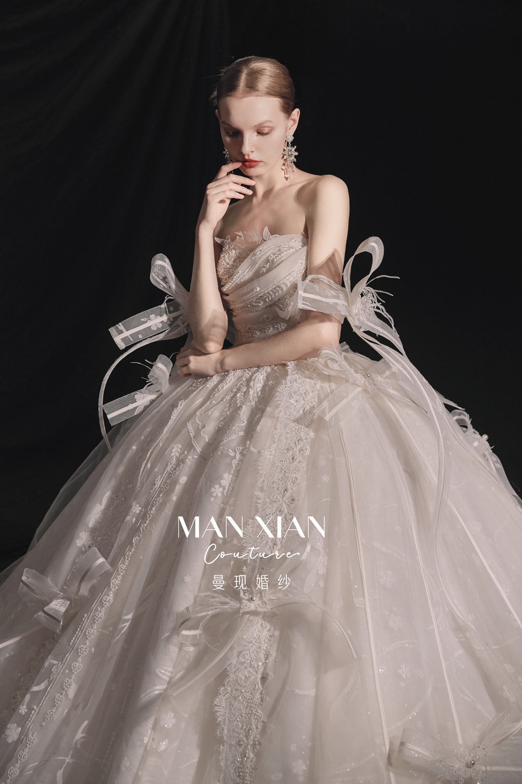 Ethereal Strapless Tulle Ball Gown Wedding Dress with Cathedral Train & Delicate Bows