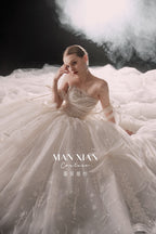 Ethereal Strapless Tulle Ball Gown Wedding Dress with Cathedral Train & Delicate Bows