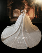 Ethereal Puff Sleeve Beaded Ball Gown Wedding Dress with Cathedral Train & Illusion Back