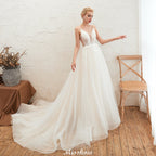 Spaghetti Straps Plunging V-Neck Wedding Dress Low Back Champagne Bridal Gown